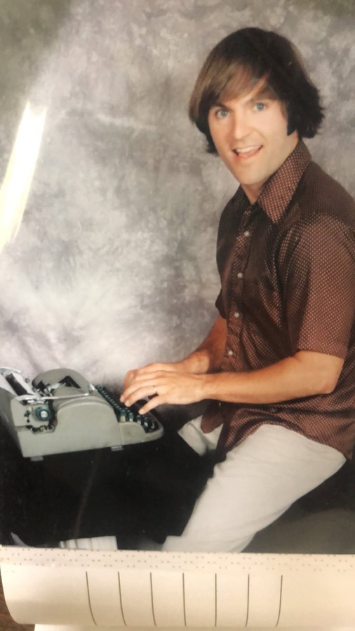 Bub Pratt seated at the Remington portable typewriter